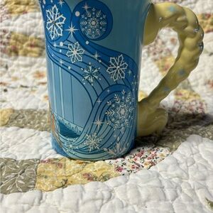 Disney Elsa Mug, has gem stones in the snowflakes.